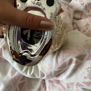 Glass golden owl that has good smelly things inside to make ur room smell good
